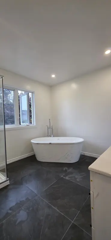Freestanding tub by the window